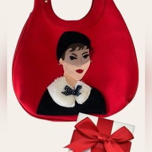 Audrey Hepburn red purse.